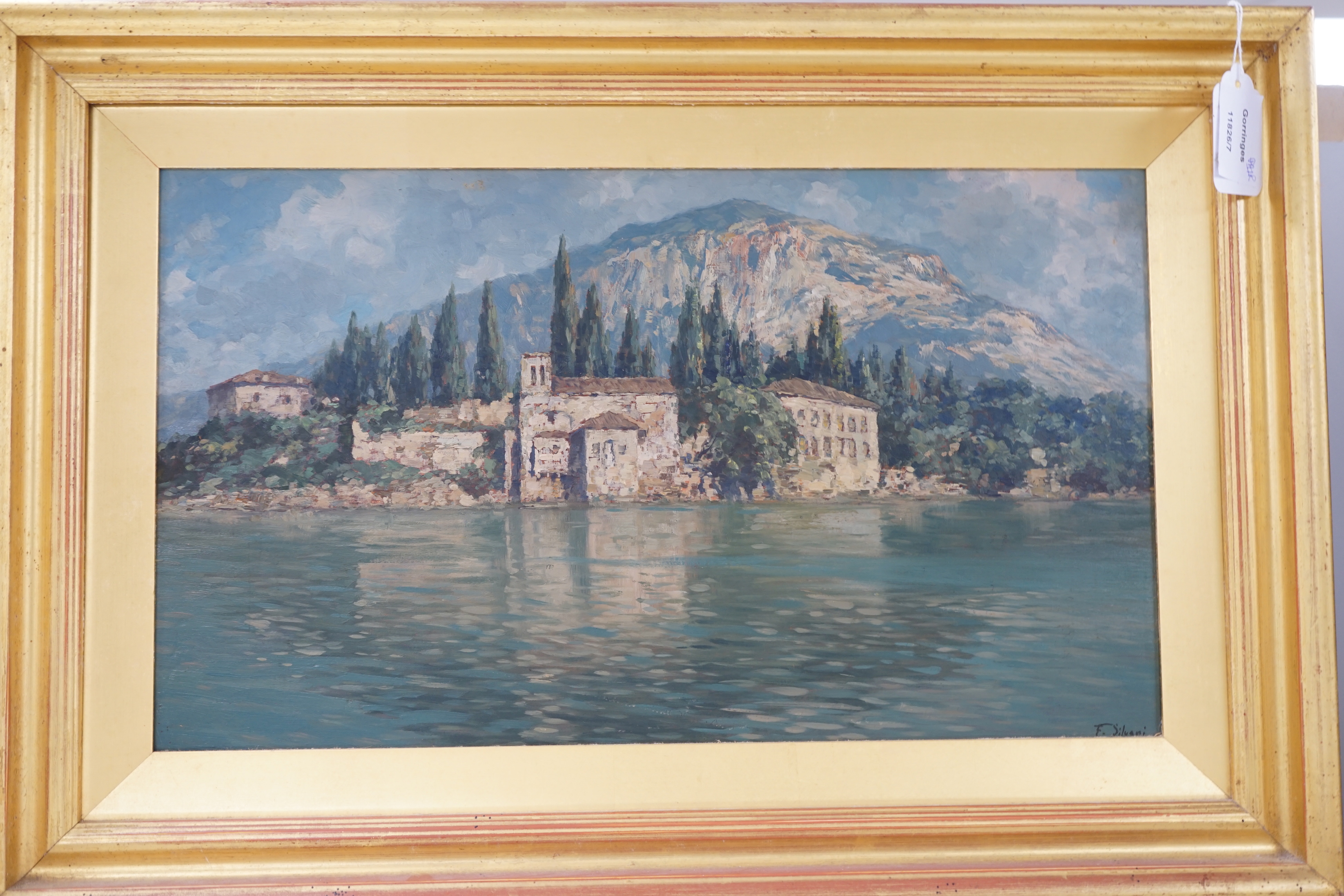 F. Silugni, pair of oils on board, Continental lakeside landscapes, both signed, largest 25 x 43cm